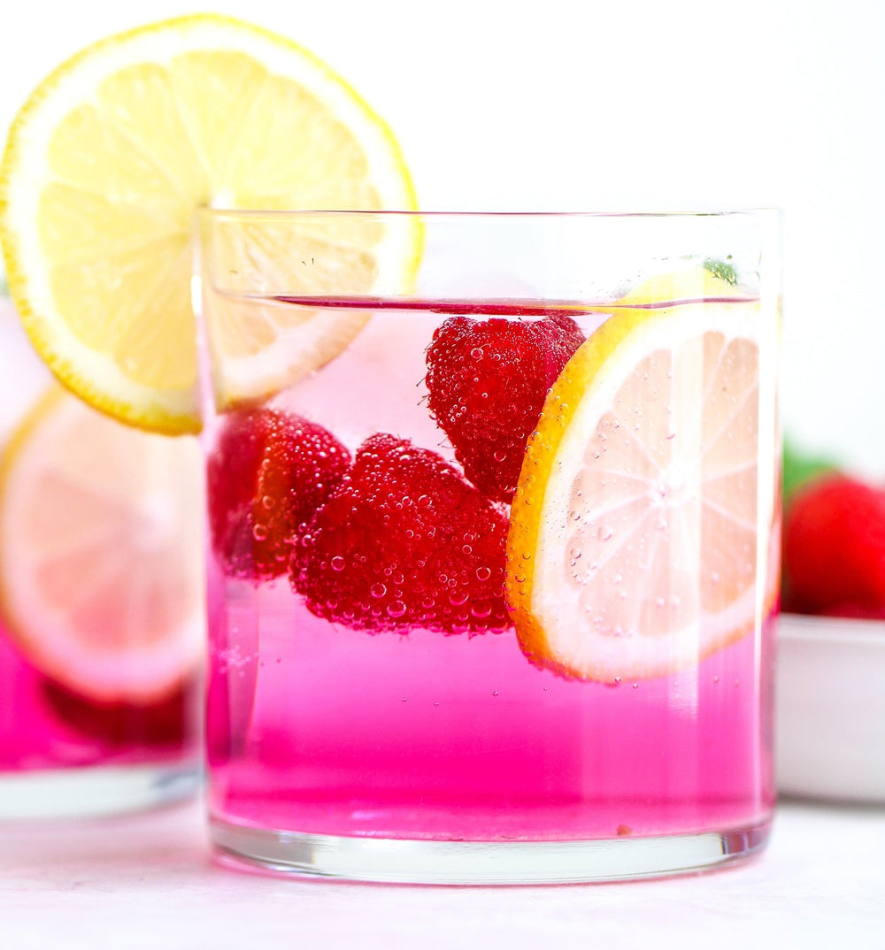 Raspberry Lemon Ultima Replenisher Electrolyte Mocktail served in a glass