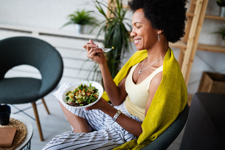 woman eating a keto salad
