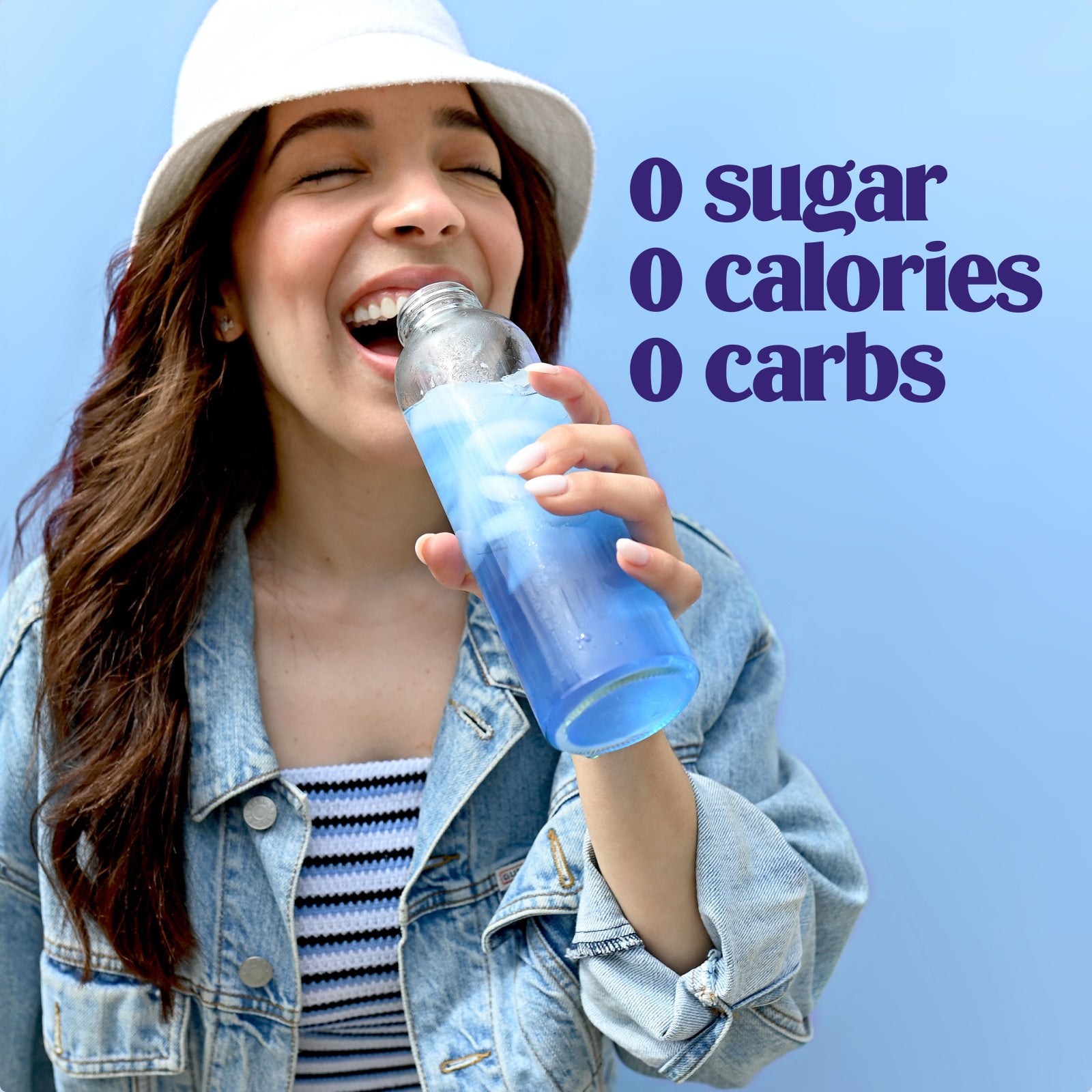 Ultima Replenisher Blue Raspberry electrolyte hydration powder lifestyle woman with bottle 000