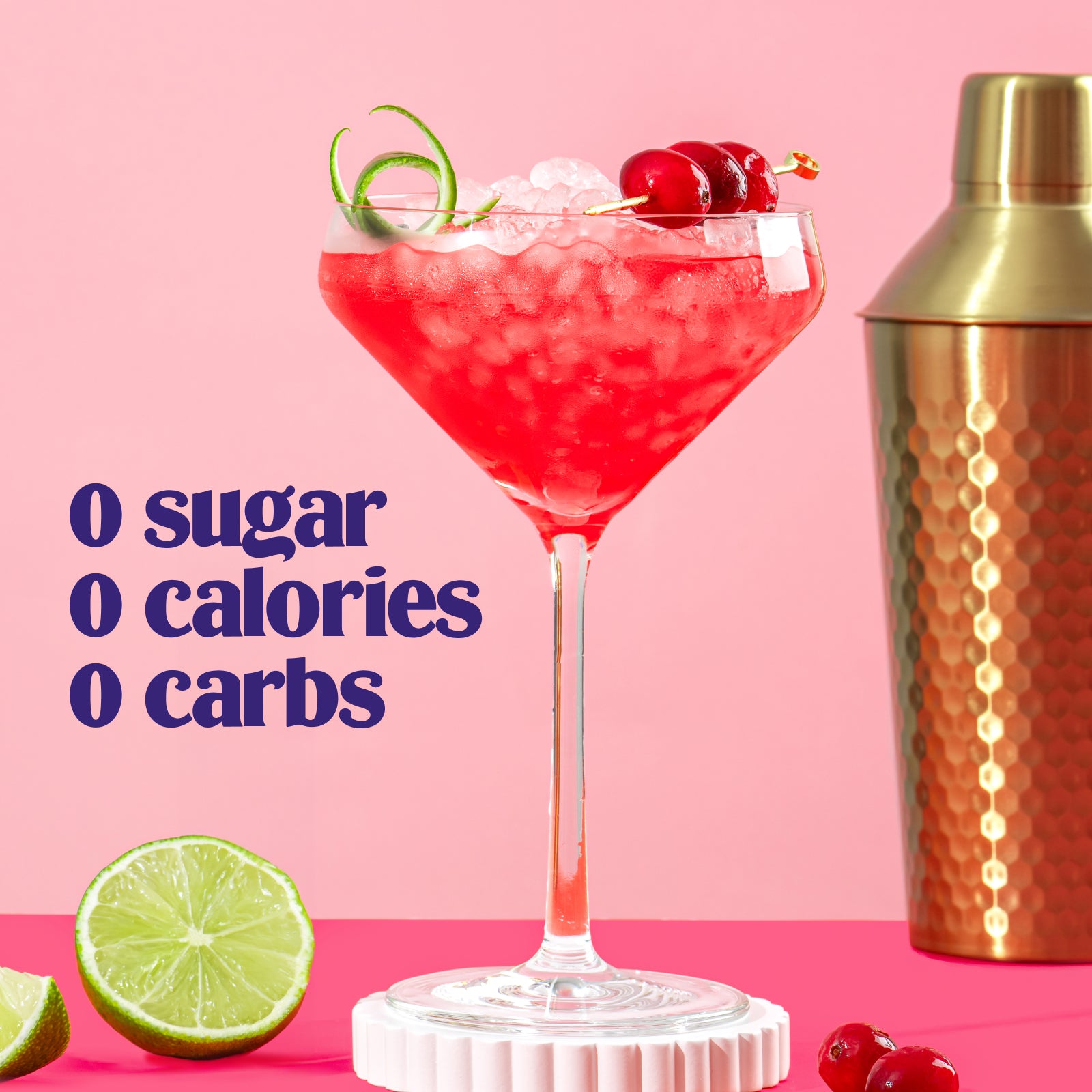 Ultima Replenisher Cranberry Cosmo Mocktini electrolyte hydration powder lifestyle with glass, fruit and 000