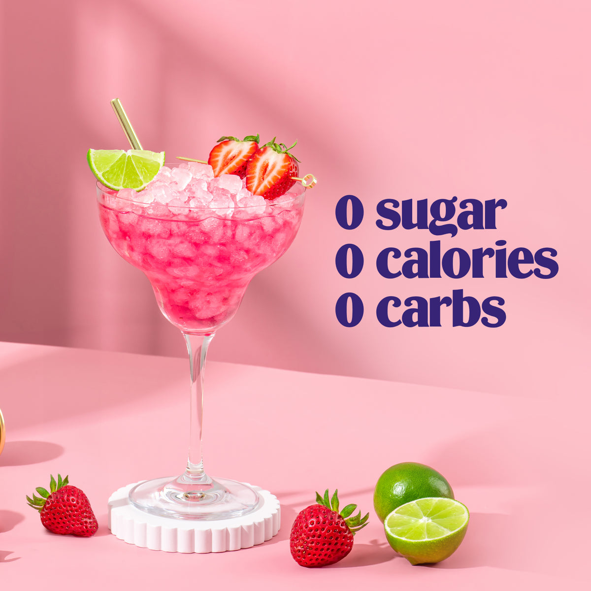 Ultima Replenisher Strawberry Margarita Mocktini electrolyte hydration powder lifestyle with glass, fruit and 000
